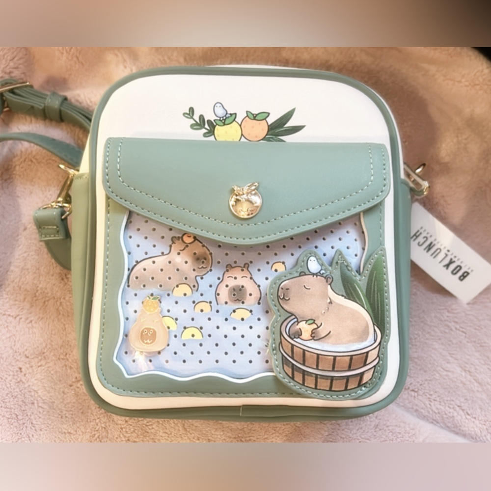 Box lunch exc capybara crossbody pin bag (pin included)
